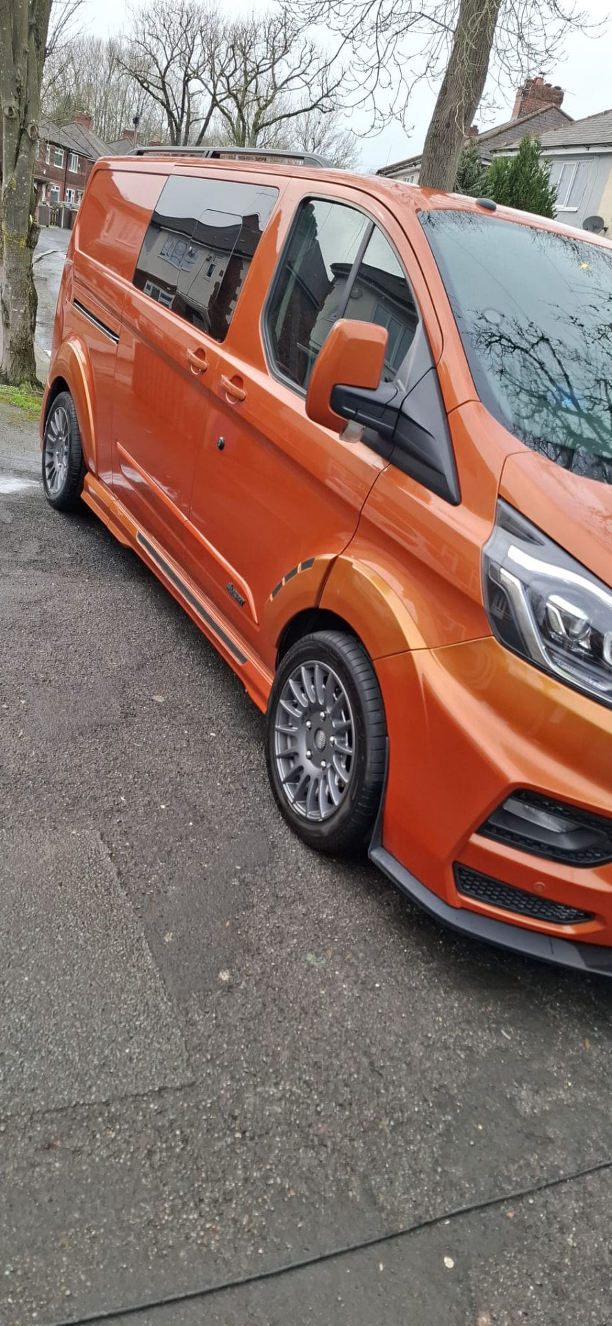 Orange Ford Transit Custom MS-RT exterior valet